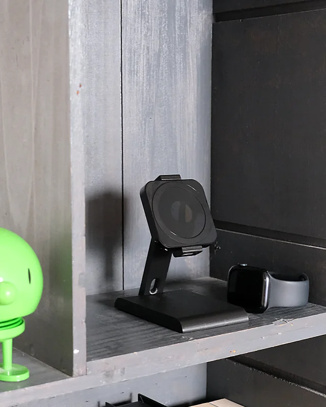 HPER on a shelf with an Apple Watch